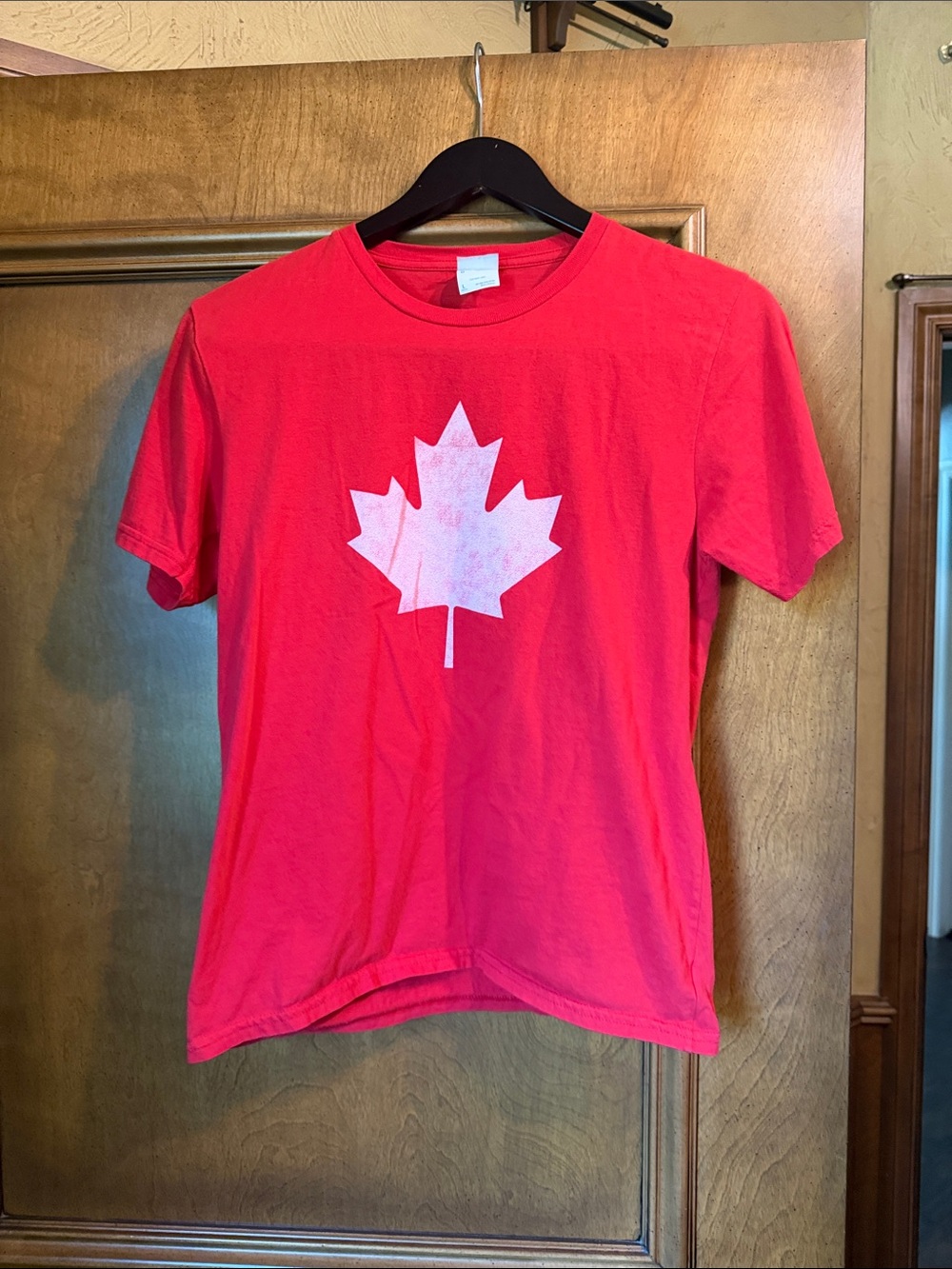 Port and Company Red Tee with White Maple Leaf Graphic